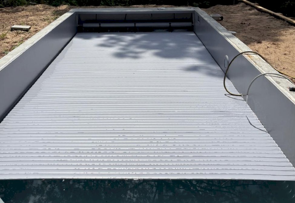 Construction d'une piscine classique en béton par Le Bassin Bleu